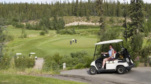 Golf cart on the course in Whitehorse