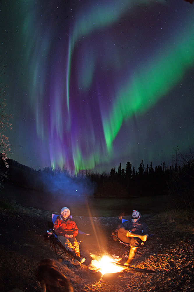 Campfire in front of Northern Lights
