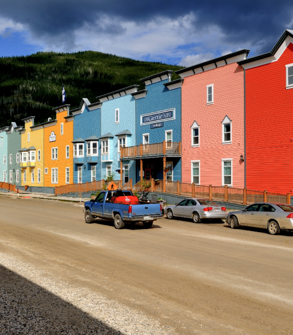 colourful buildings line the boardwalk streets of Dawson City