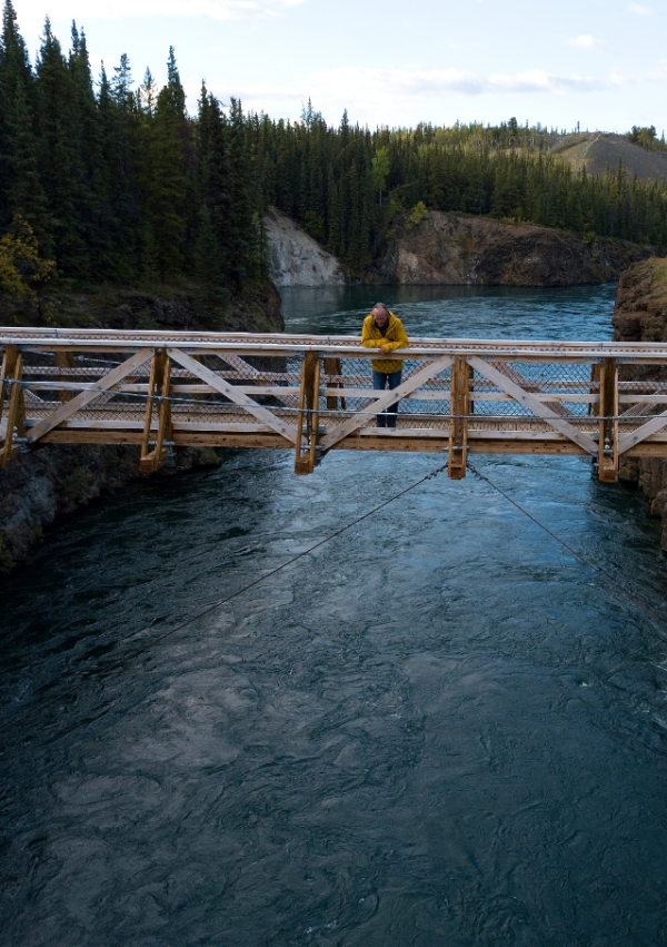 Man over the Yukon River at Miles Canyon