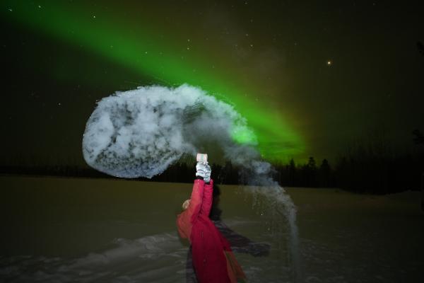 Experience the "cold-fun activity" while enjoying the northern lights.