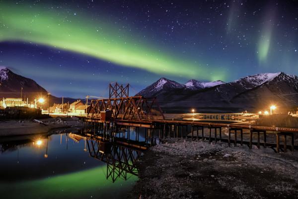 The northern lights shine above Caribou Mountain and the Nares River in Carcross.