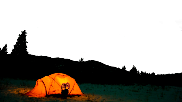 Tent in front of hills