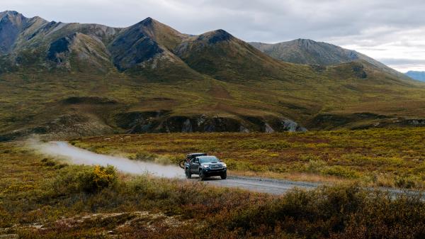 Truck drives along the Dempster Highway