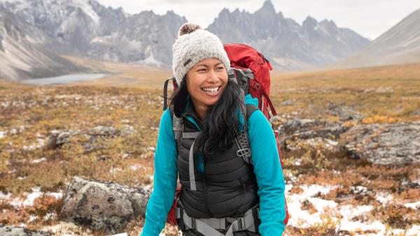 Woman smiling hiking through the Tombstones