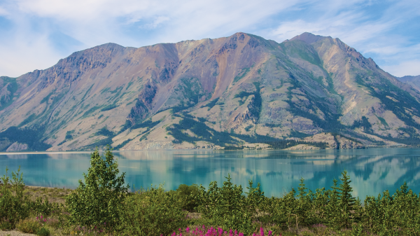 Summer lake and mountain view from Alaska highway
