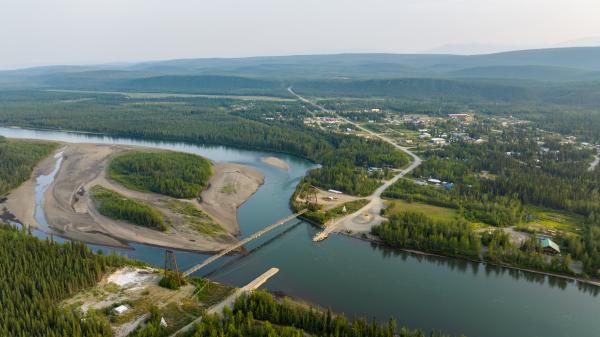 Aerial view of Ross River and the North Canol Road crossing the Pelly River.