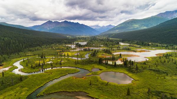The Lapie River meanders northwards through the Pelly Mountains along the South Canol Road.