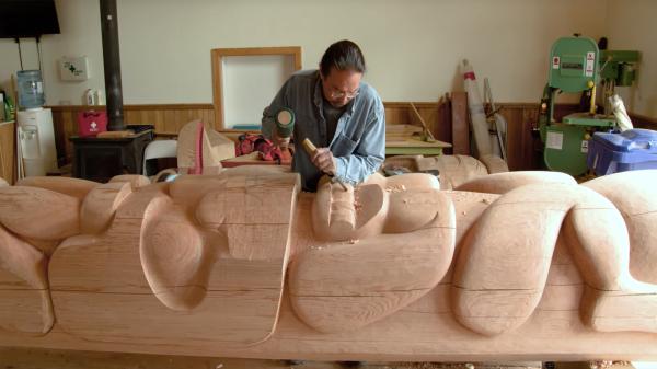 Keith Wolfe Smarch carving in his shed