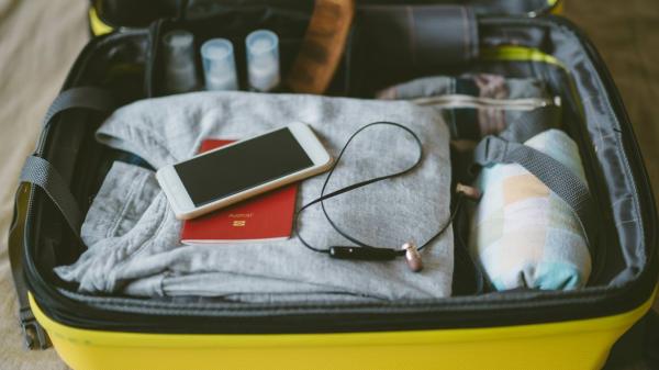 A full suitcase packed well for a visit to the Yukon