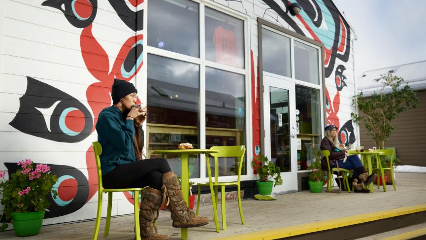 woman sipping a coffee in carcross