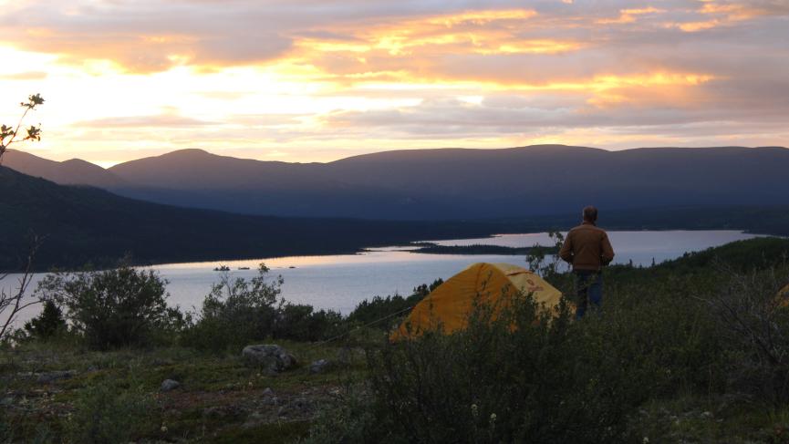 tent overlooking a lake
