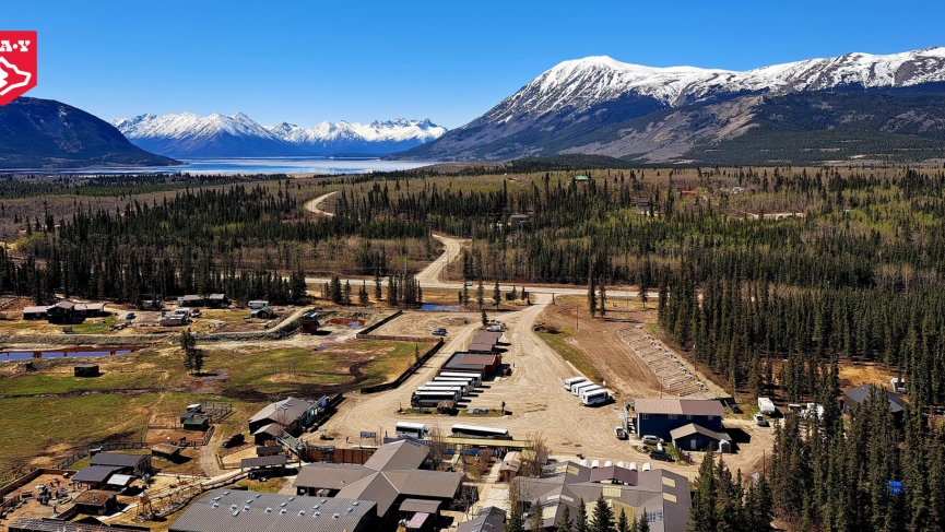 Bird's eye view of the grounds with Lake Bennett and the mountains in the background.
