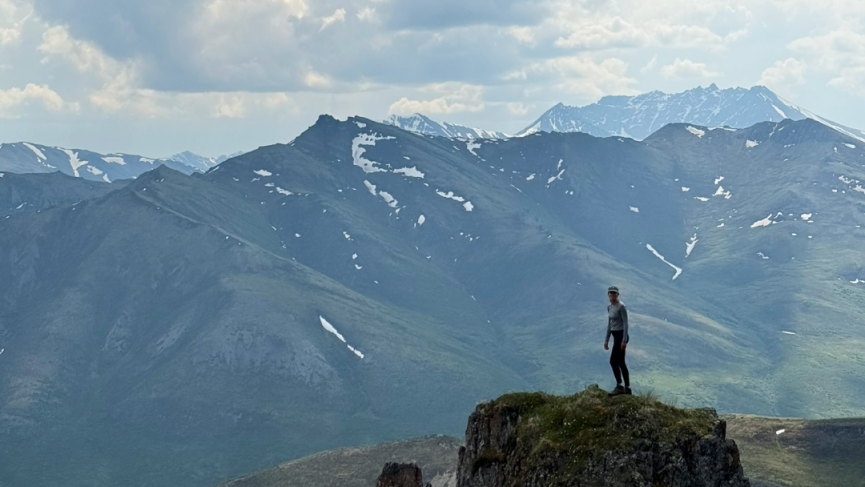 Hiker in Tombstone Territorial Park
