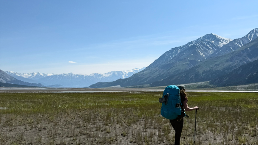 Hiker on Ä'äy Chù (Slim's River) West trail