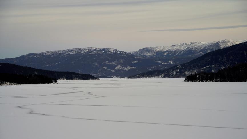 Frozen lake in the Yukon with ski tracks