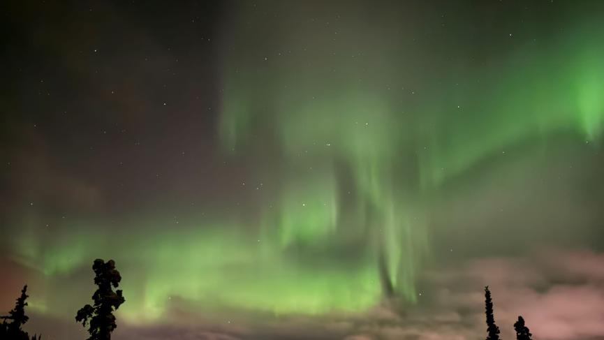 Northern lights above Whitehorse from top of Mount Sima