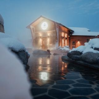 Woman relaxing in hot springs