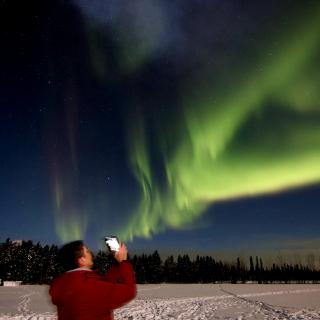 Very low lying aurora are visible at our viewing site