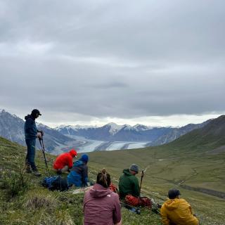 Hikers overlooking the Kaskawulsh Glacier on Observation Mountain