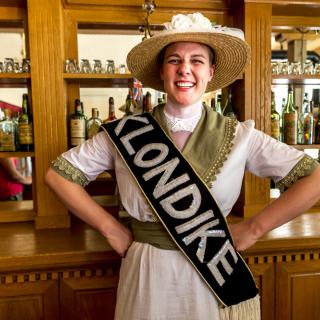 Parks canada staff dressed in garb from the gold rush era