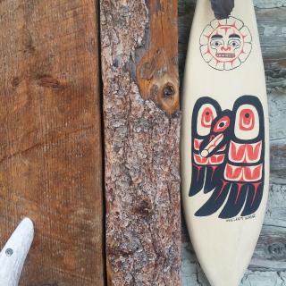 First nations carving on a paddle