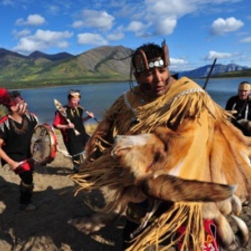 Dancers in regalia perform at an event