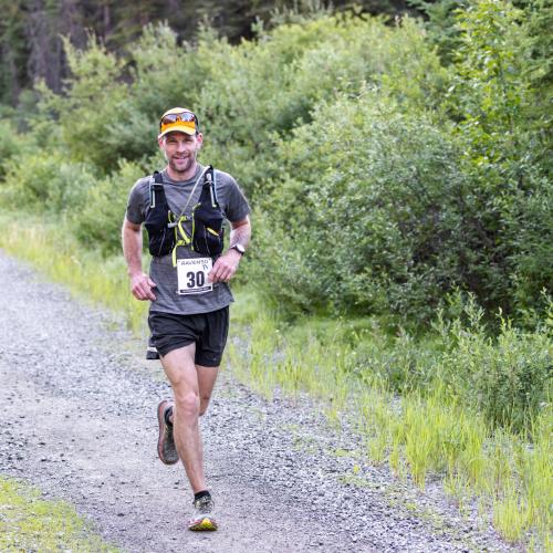 Raven50 runner on a gravel trail