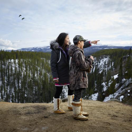 KDFN citizens Mother and son on the land looking and calling for Moose and Birds