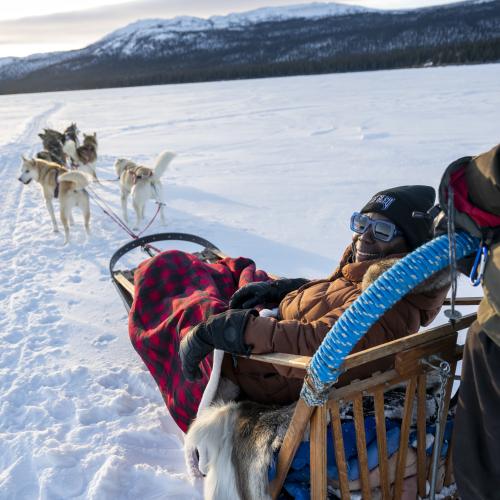 dog sledding on a frozen lake.
