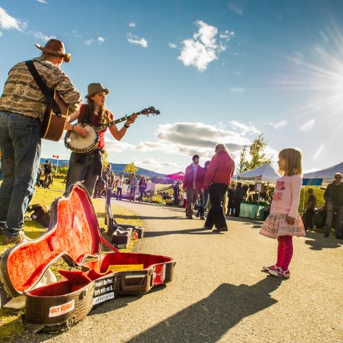 Musicians perform to the public at the summer Fireweed Community Market at Shipyards Park in Whitehorse.