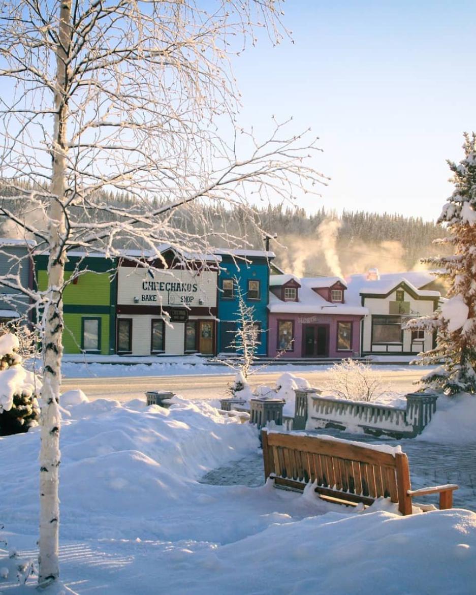 Colourful buildings in Dawson City are covered in fresh snow