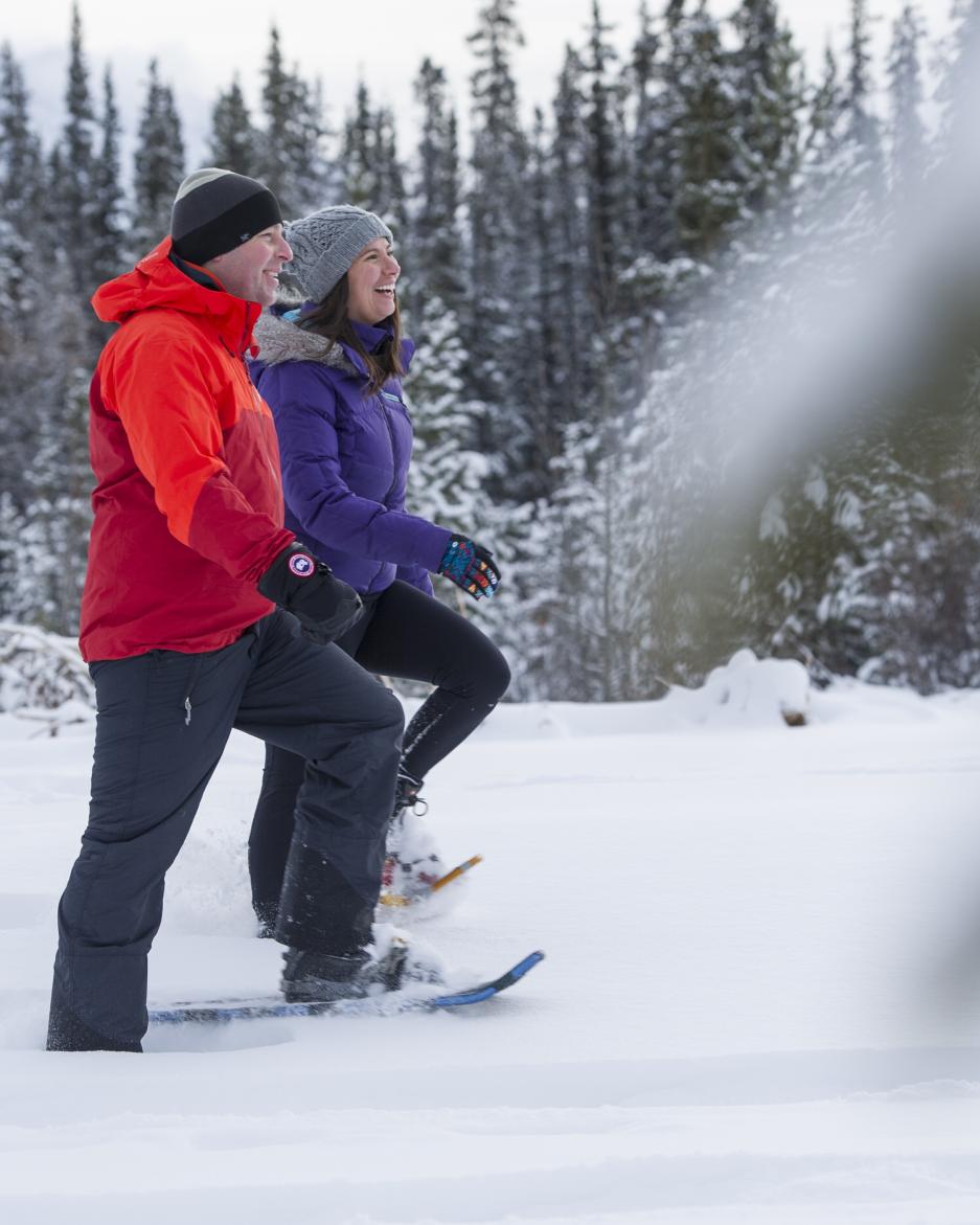 Two people snowshoe in the Yukon