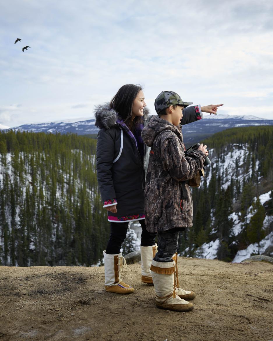 KDFN citizens Mother and son on the land looking and calling for Moose and Birds