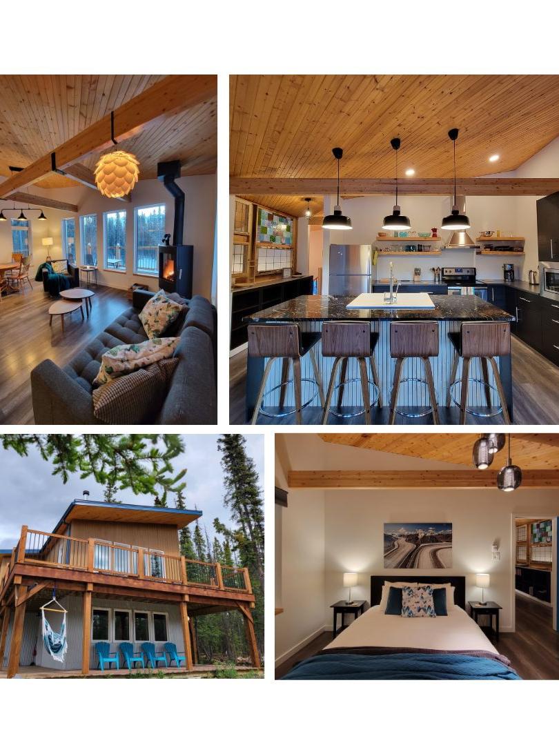Kluane Skyline kitchen, eating area, stylish open concept living room and comfortable sleeping arrangements.
