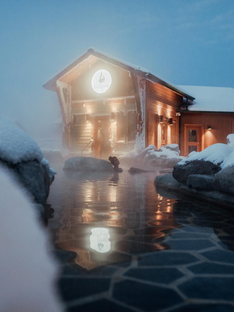 Woman relaxing in hot springs