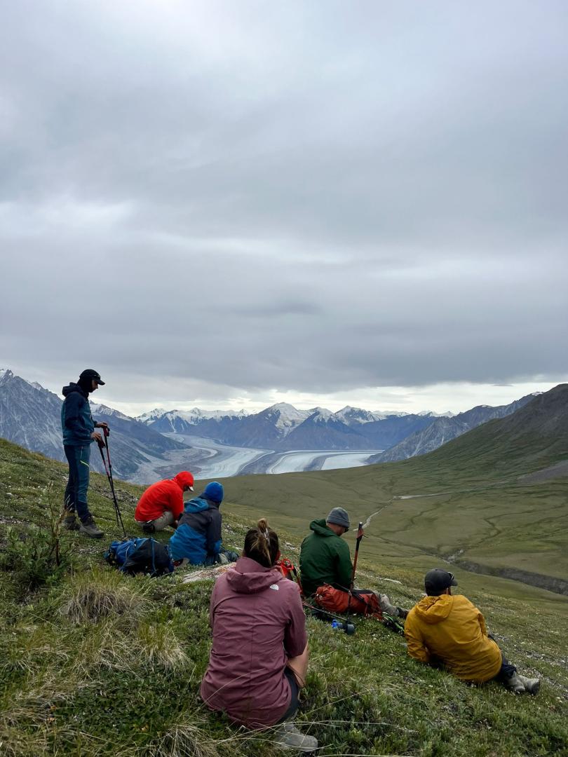 Hikers overlooking the Kaskawulsh Glacier on Observation Mountain
