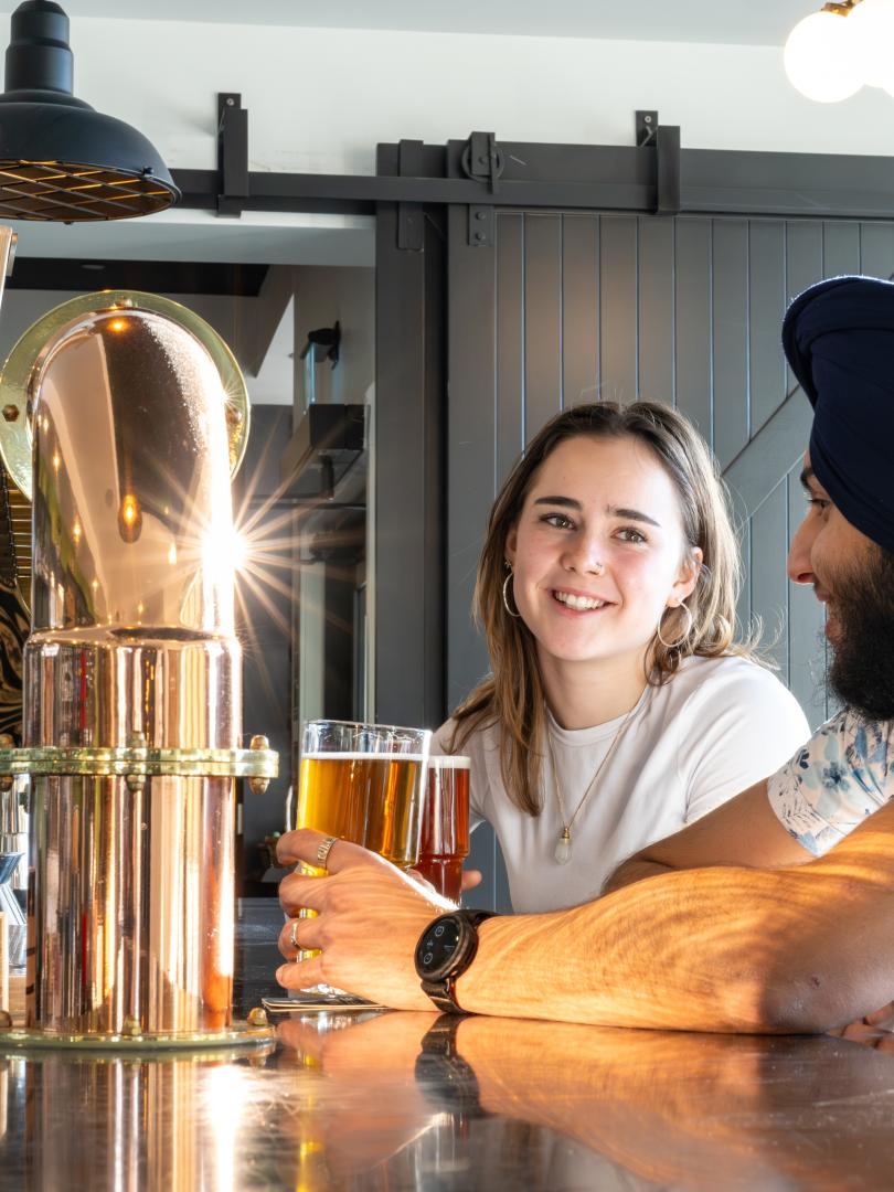 A couple enjoying food a restaurant in Whitehorse