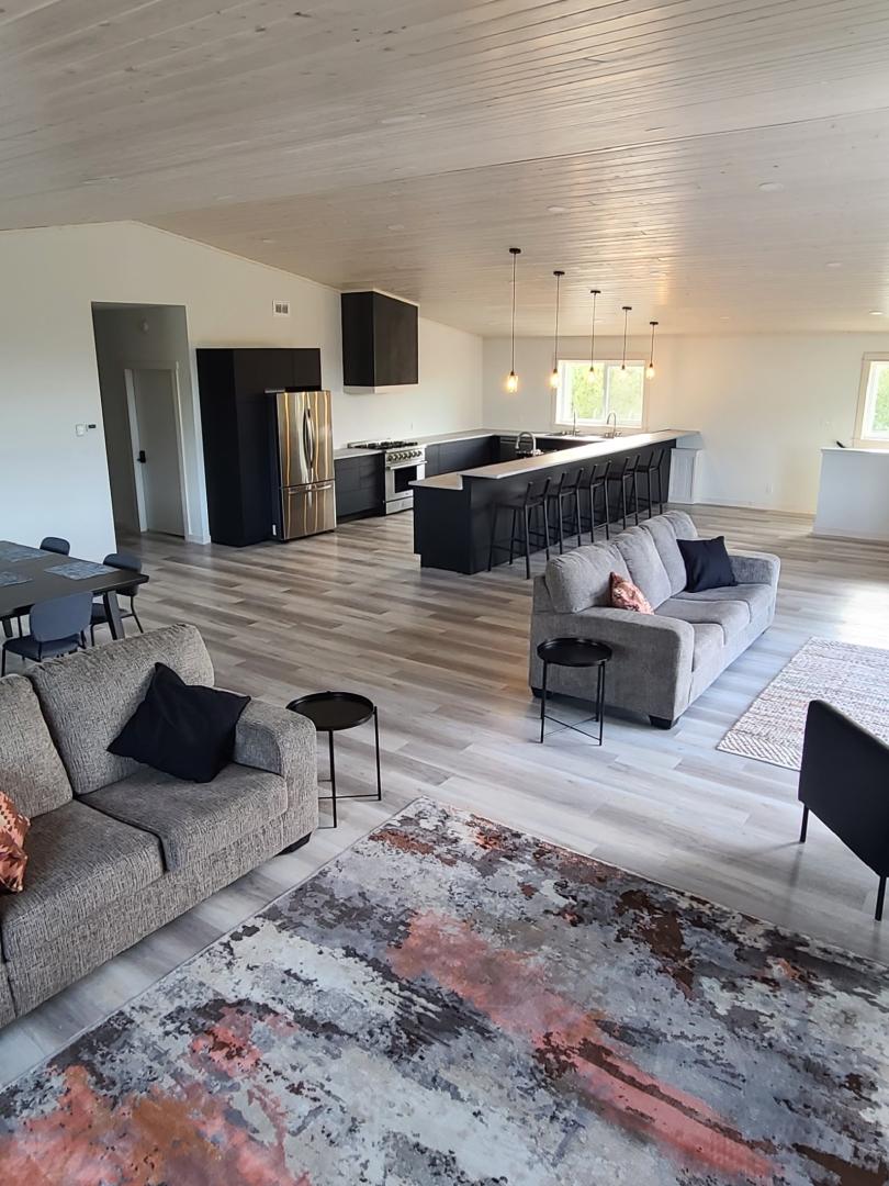 spacious living and dining room and kitchen