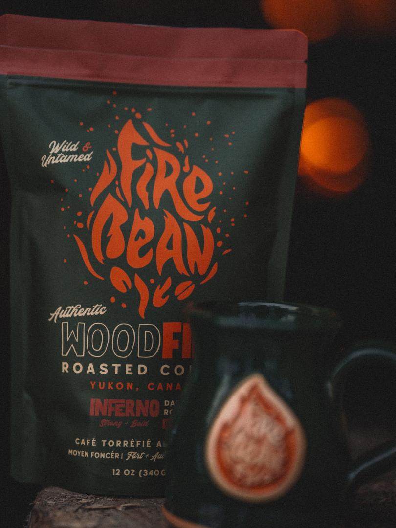 A bag of Firebean Coffee with a Fireglow in the background