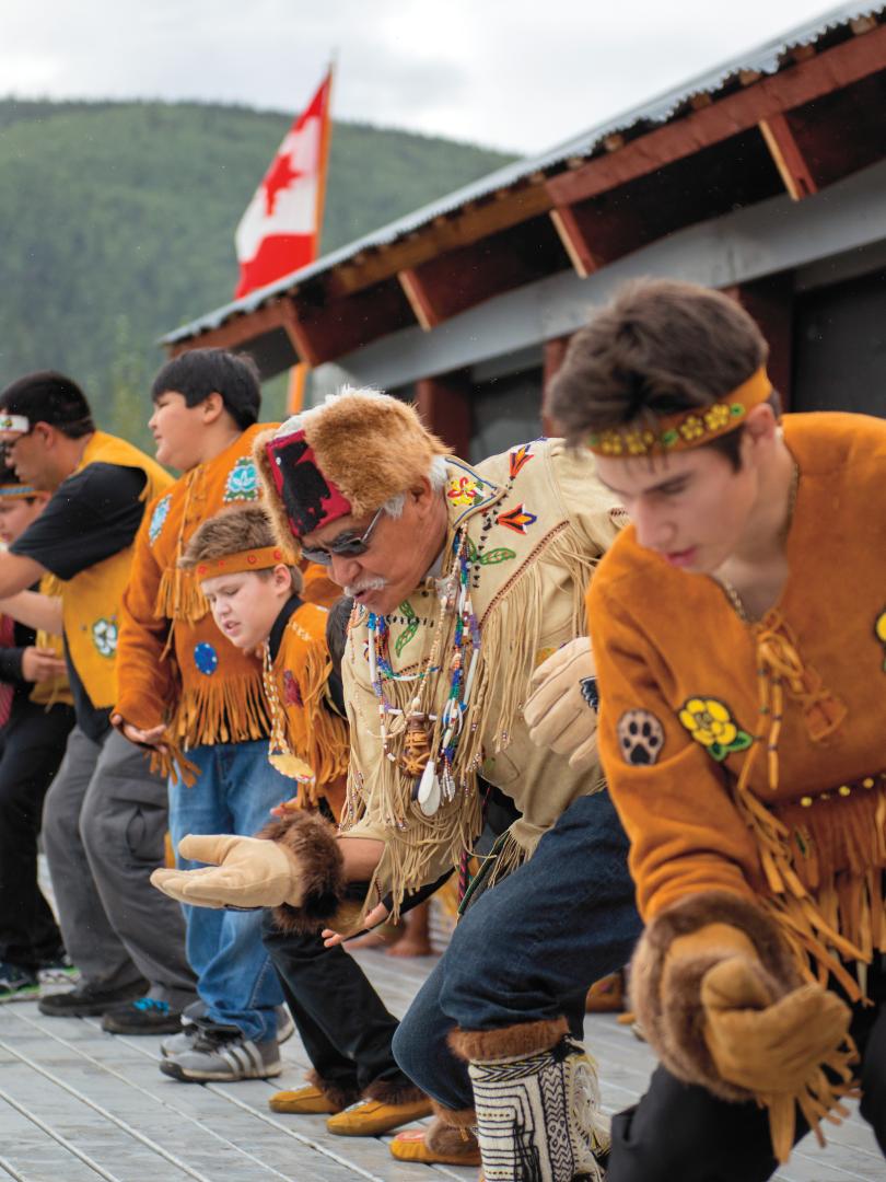 First Nation men dancers at the Moosehide Gathering