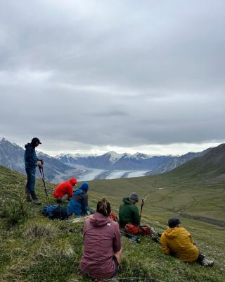Hikers overlooking the Kaskawulsh Glacier on Observation Mountain