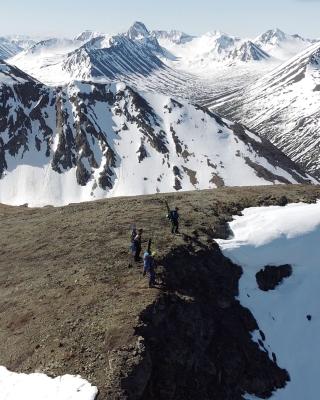 3 skiers on summit photo.jpg