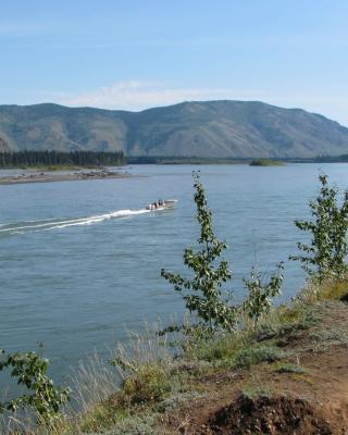 A boat jets along the Yukon River