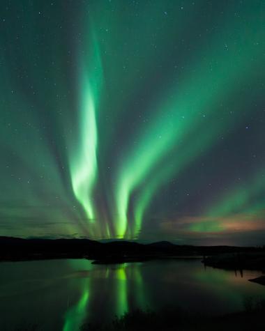 Northern lights shine above Lewes Lake
