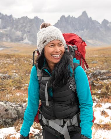 Woman smiling hiking through the Tombstones