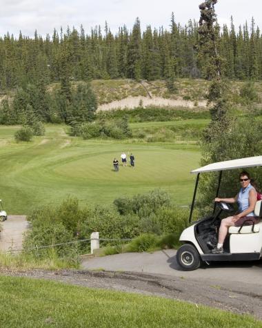 Golf cart on the course in Whitehorse