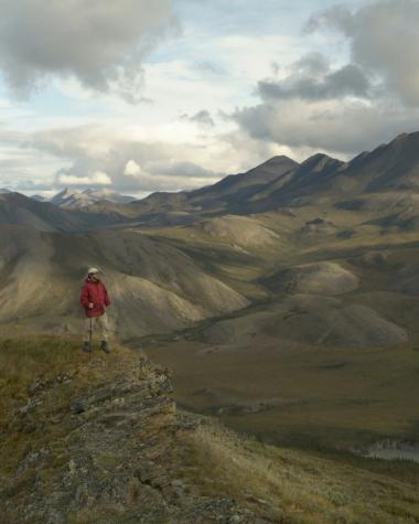 A person takes in the spectacular view of Ivvavik National Park in northern Yukon