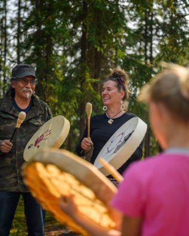 Kaska elder and artist Dennis Shorty and his wife Jenny Frohling singing and drumming at Dennis’ studio in Ross River.