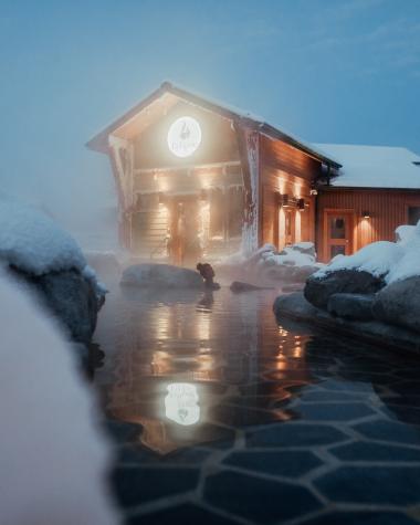 Woman relaxing in hot springs